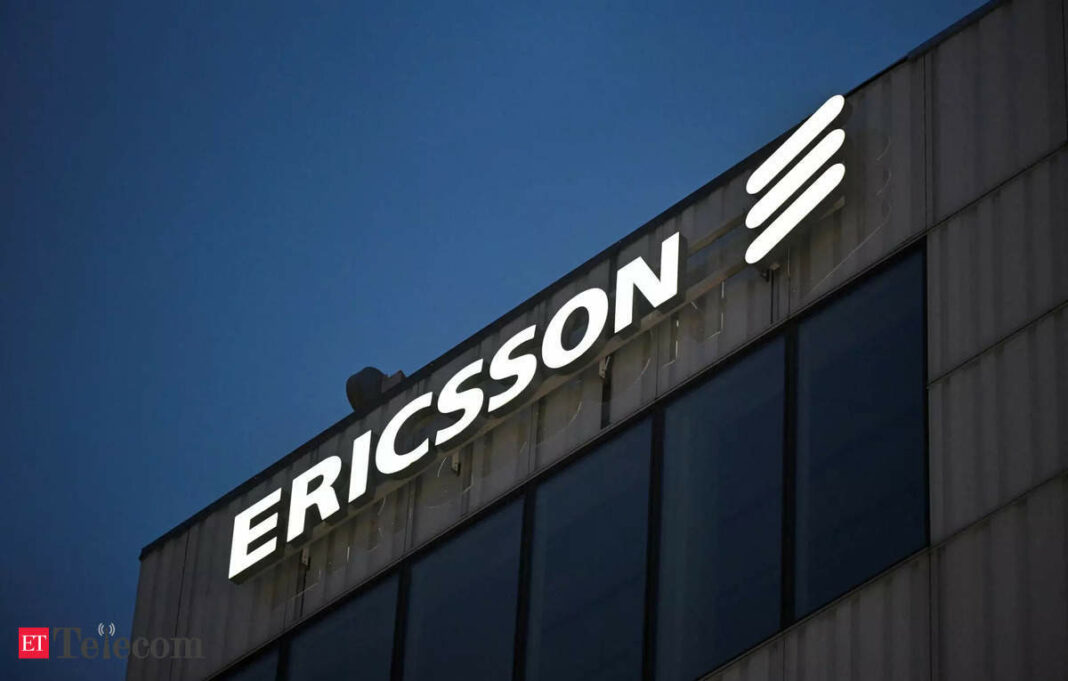 Ericsson logo on building facade at dusk.