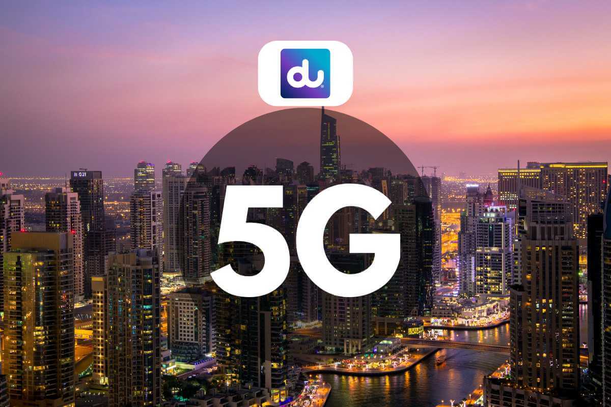 Cityscape with 5G technology advertisement at dusk