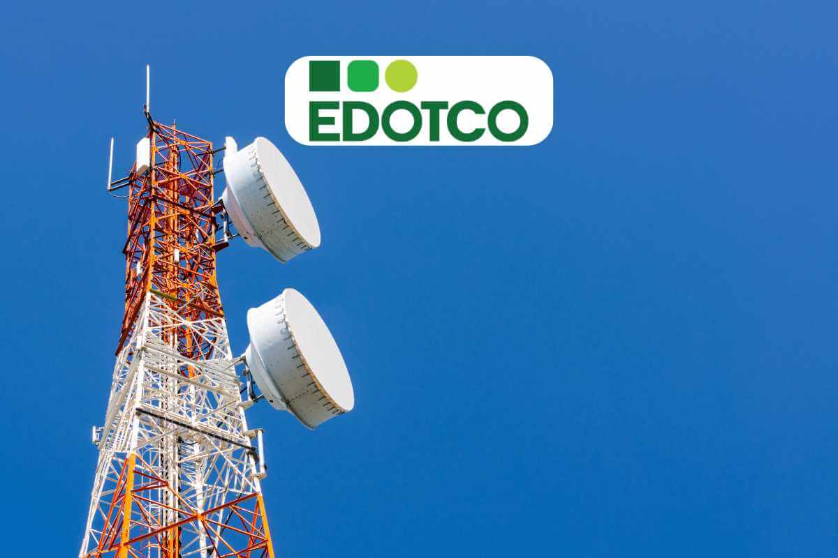 Edotco telecommunications tower against blue sky.