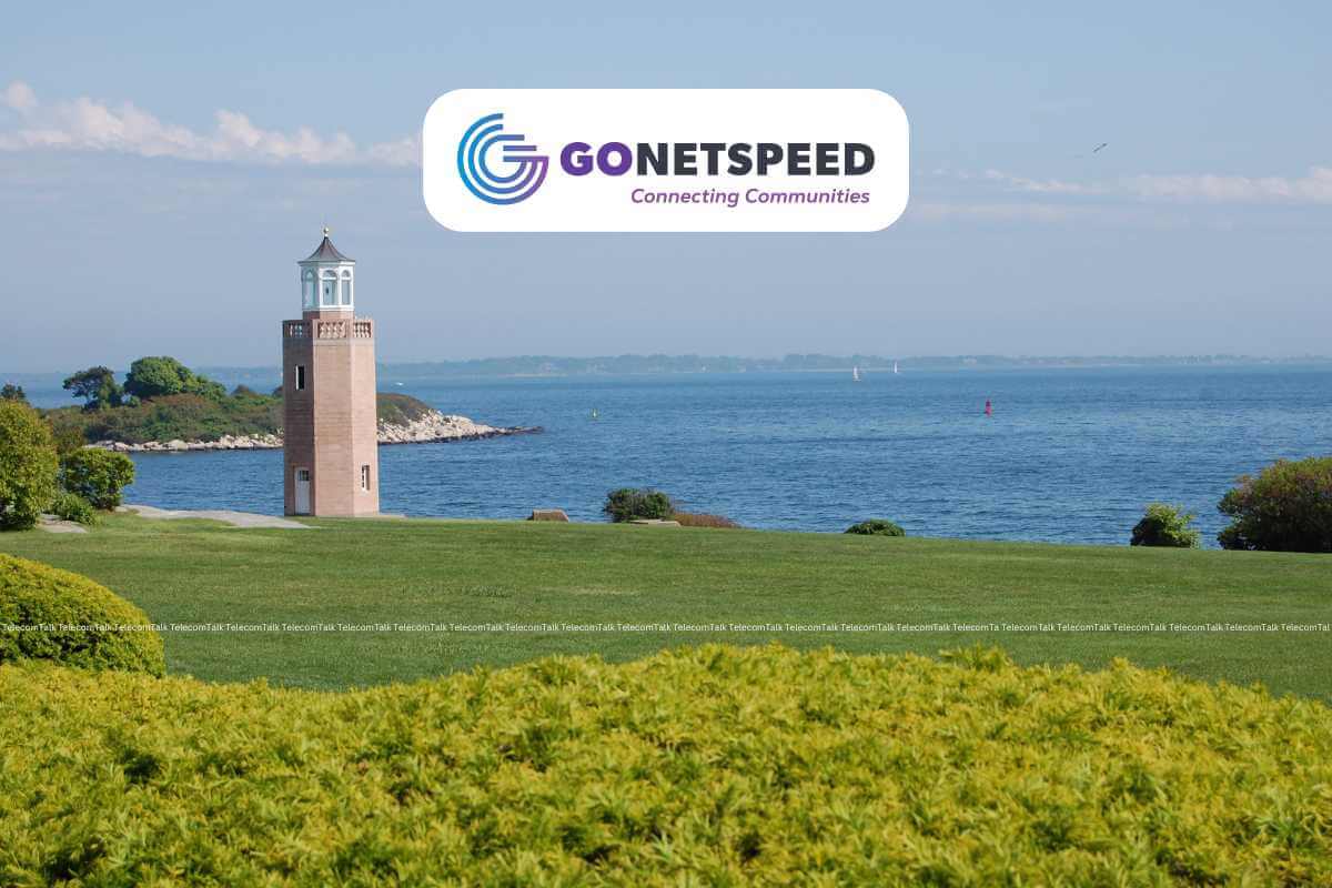 Coastal landscape with GoNetspeed logo and slogan.