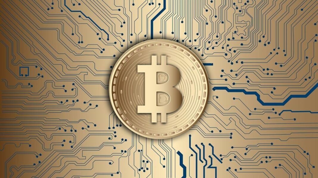 Bitcoin coin on digital circuit pattern.