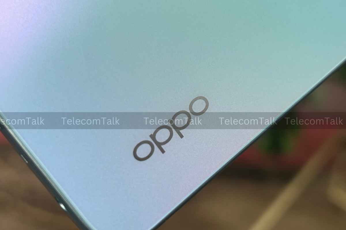 Close-up of OPPO smartphone corner with logo.