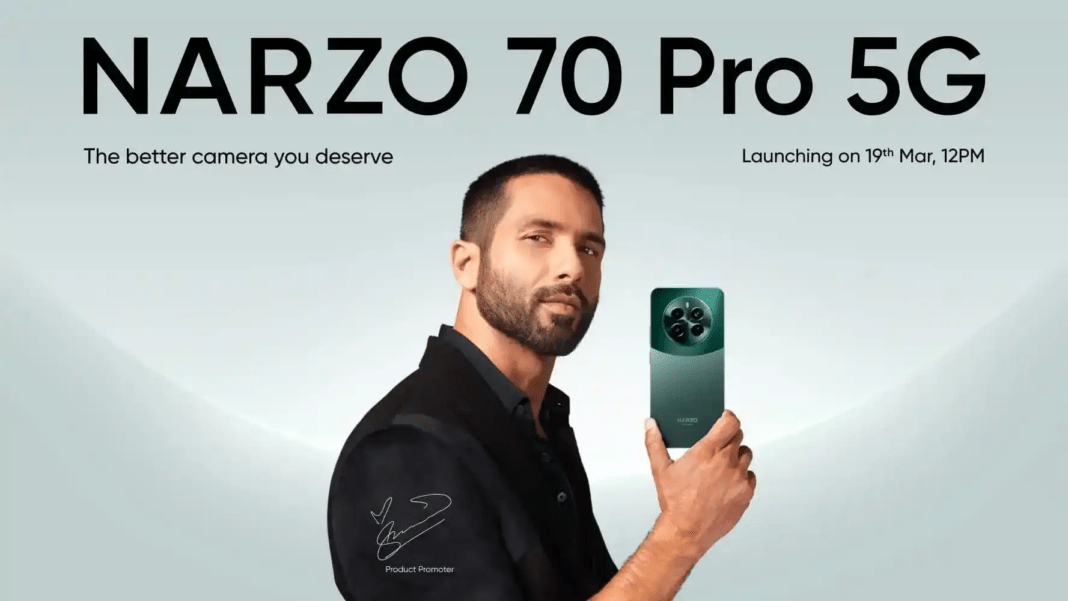 Man holding NARZO 70 Pro 5G smartphone.