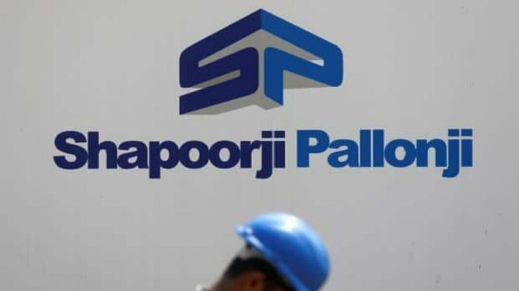 Shapoorji Pallonji logo with person wearing a blue hardhat.