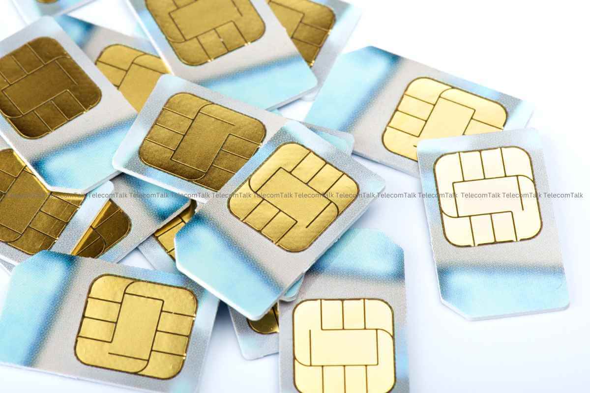 Assorted SIM cards on white background.