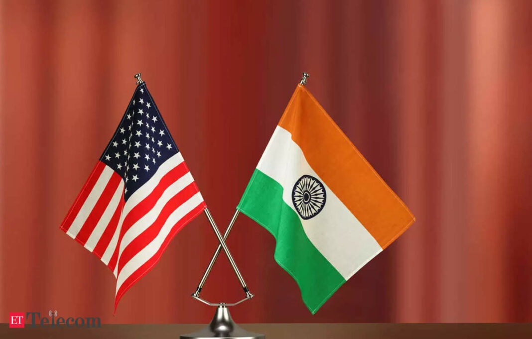 US and India flags on stand