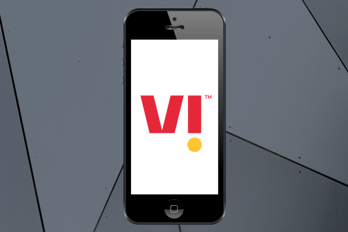 Smartphone displaying red and yellow logo on screen.