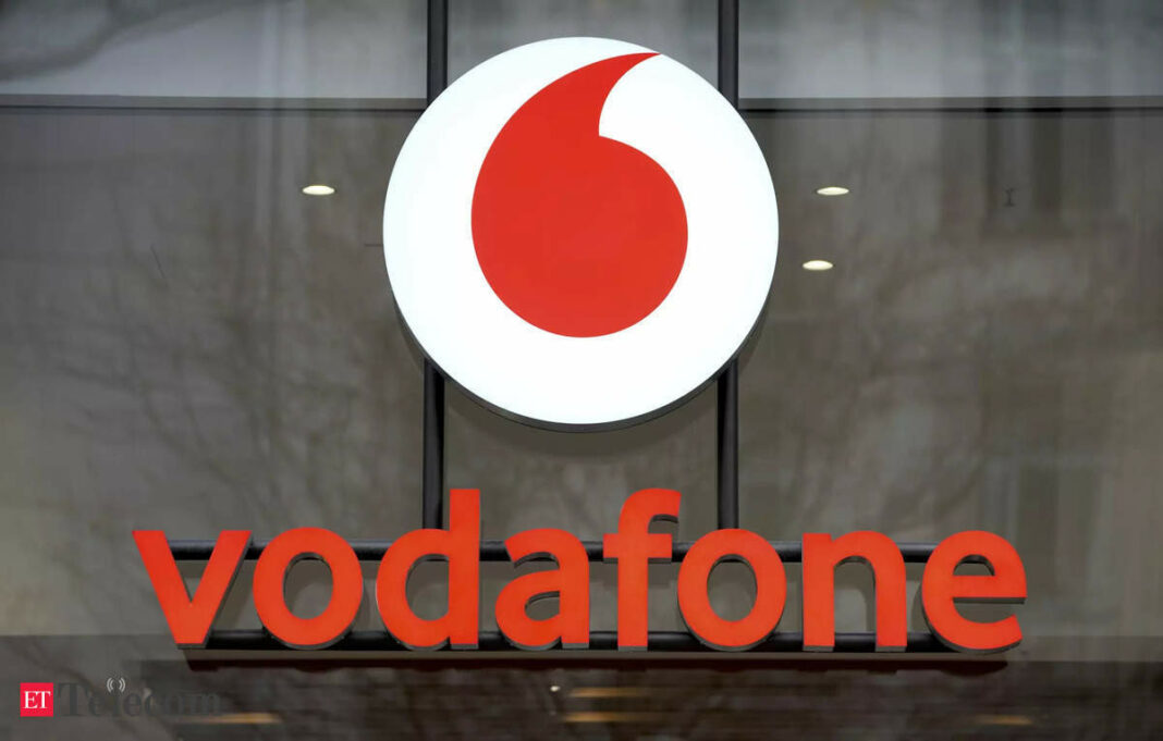 Vodafone sign on storefront for branding and visibility.