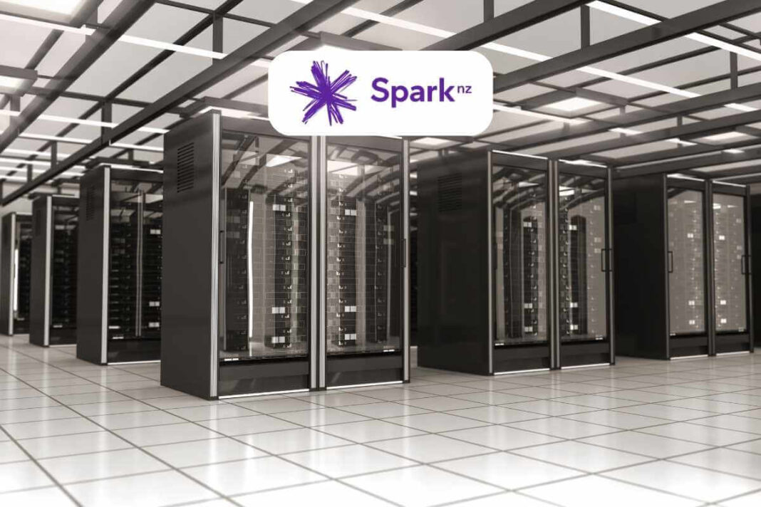 Modern data center server room with Spark NZ sign.