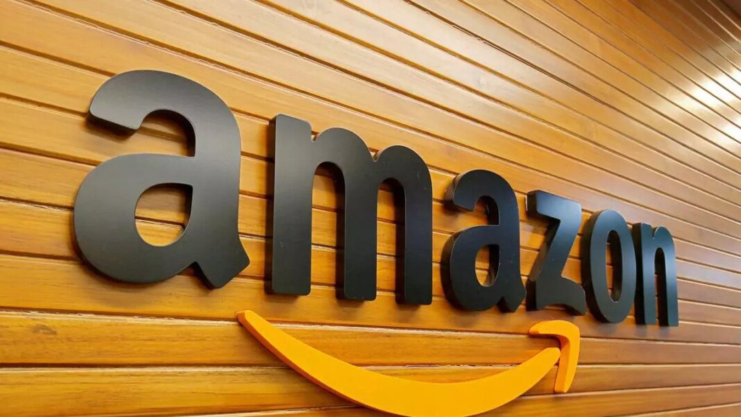 Amazon logo on wooden background.
