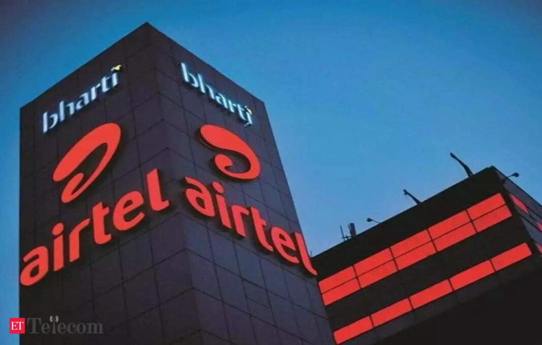 Bharti Airtel building signage at twilight.