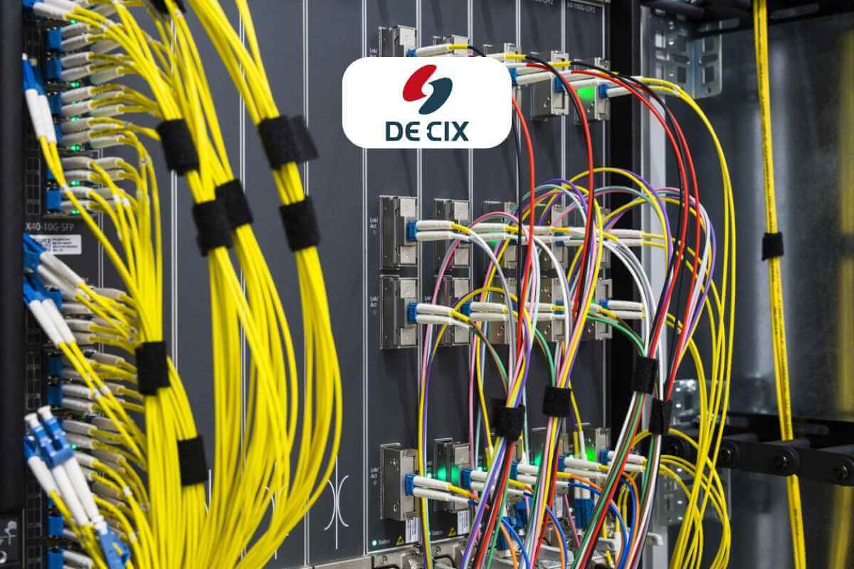 Data center network cables and equipment with company logo.