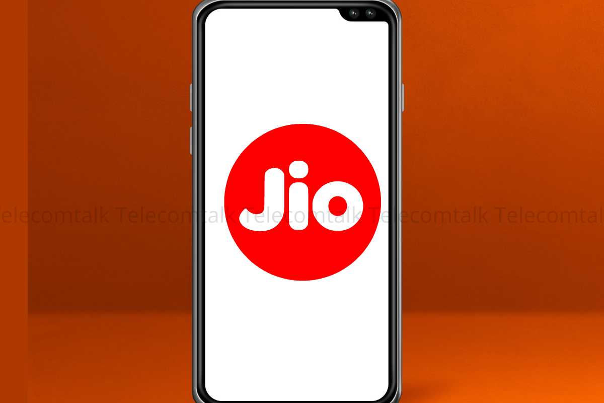 Smartphone displaying Jio logo on screen.