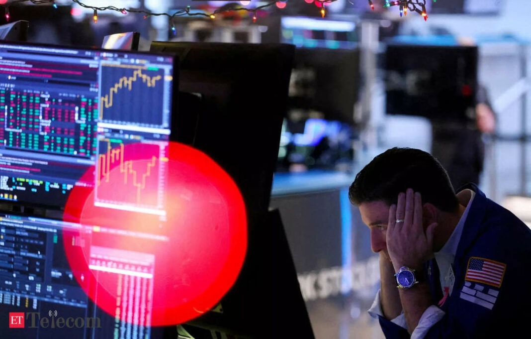 Stock trader stressed over market data screens.