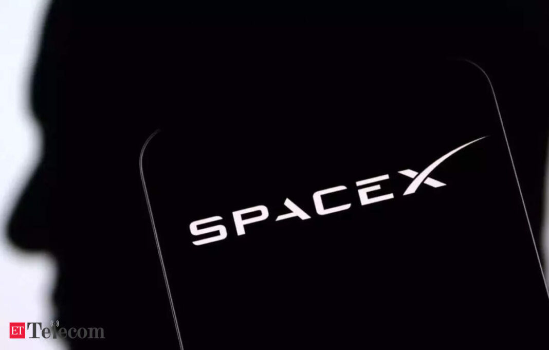 SpaceX company logo on black background.