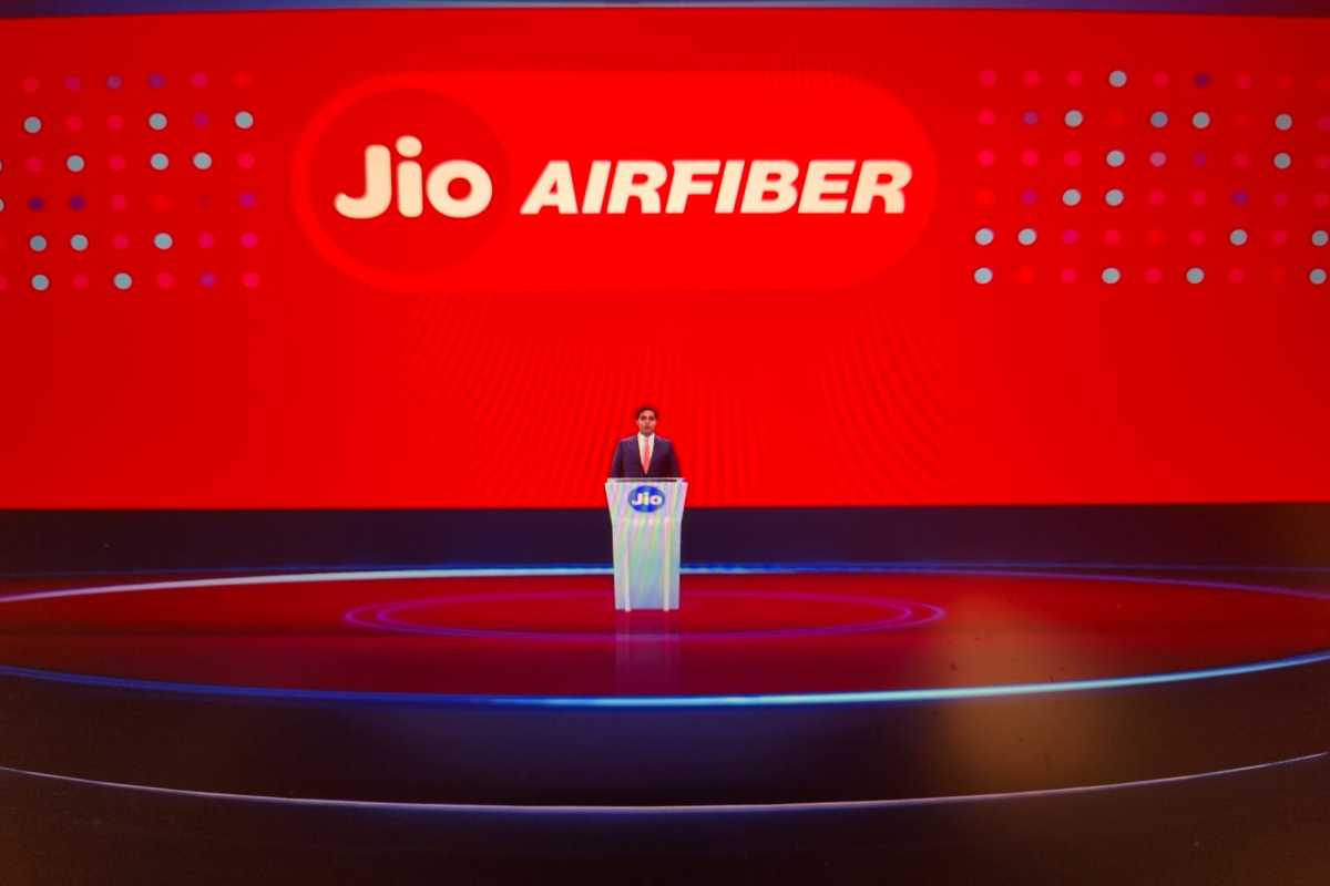 Person presenting at Jio AirFiber event.