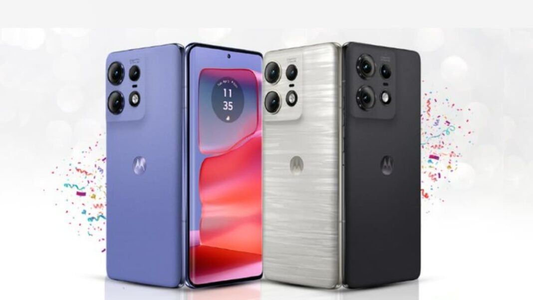 Three Motorola smartphones, colorful backdrop.