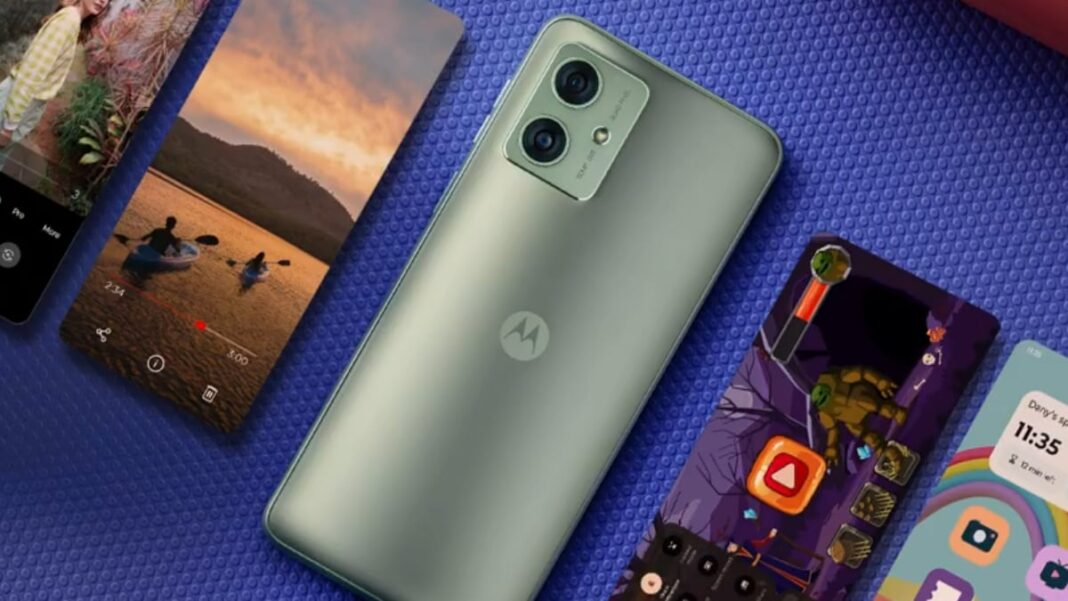 Motorola smartphone with dual cameras on textured surface.