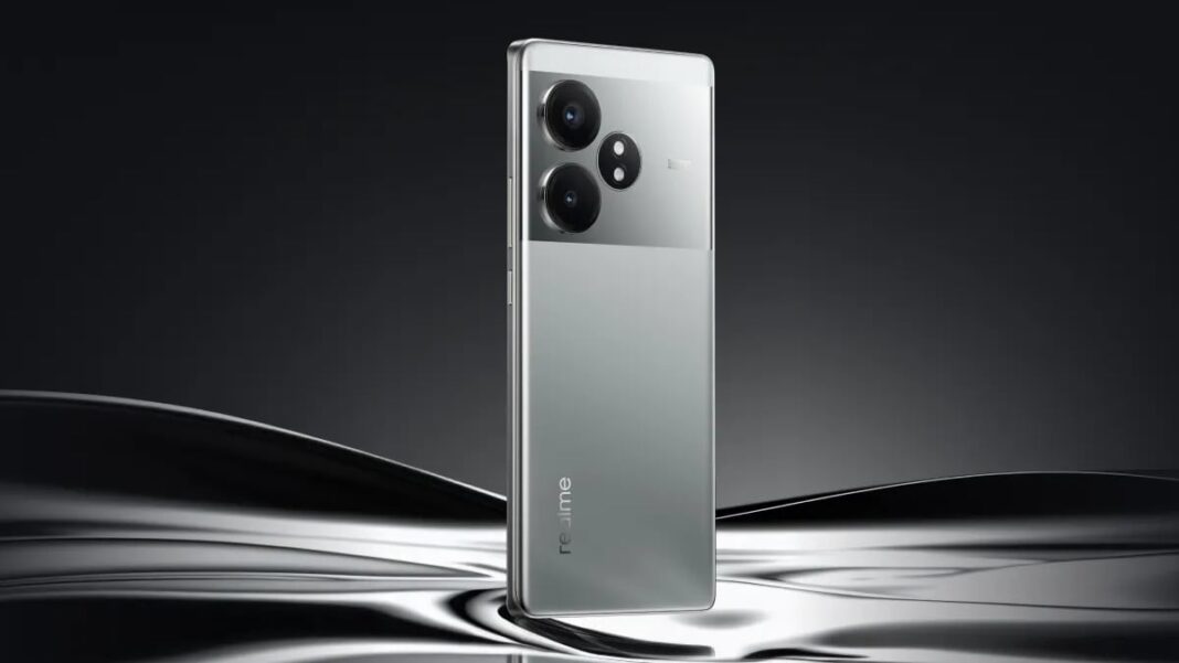 Silver smartphone with triple cameras on dark background.