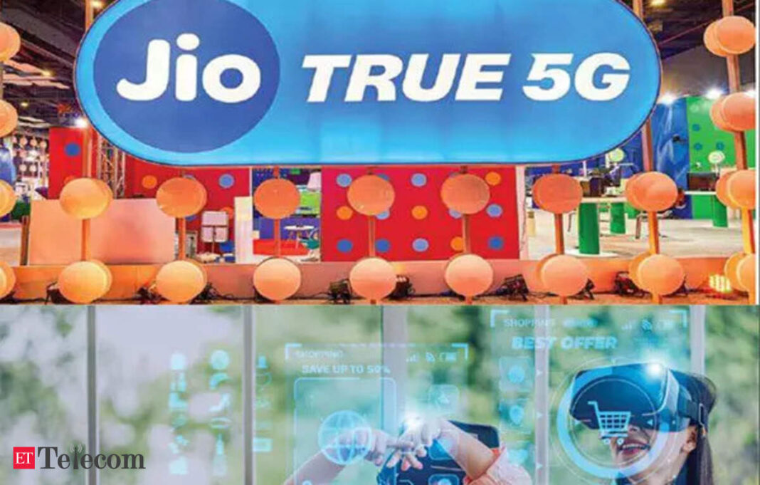 Jio True 5G promotional booth with technology displays.