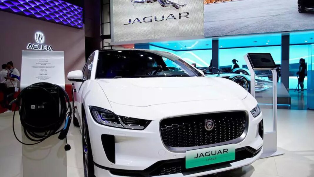 White Jaguar I-PACE electric vehicle at auto show