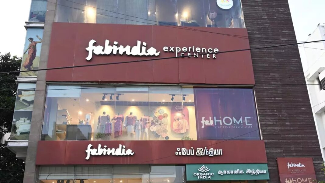 Fabindia store front with branding and display window.