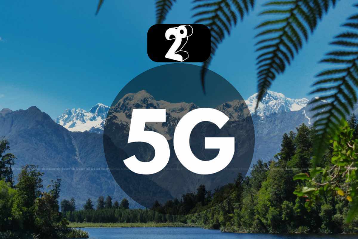 5G technology symbol over mountain lake landscape.