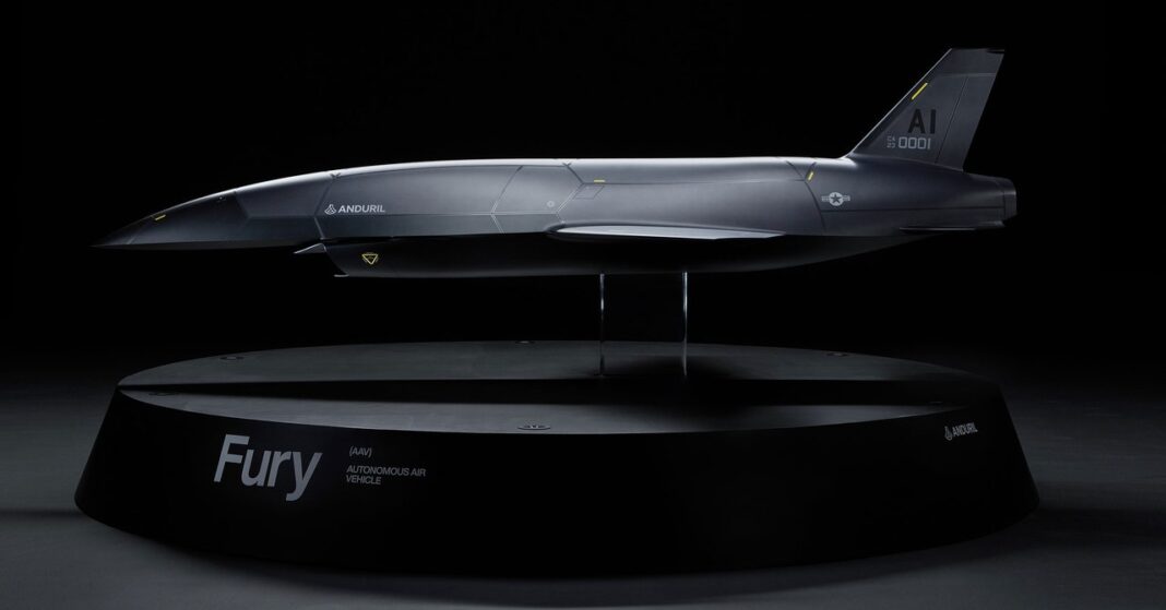 Autonomous aerial vehicle "Fury" on display, dark background.
