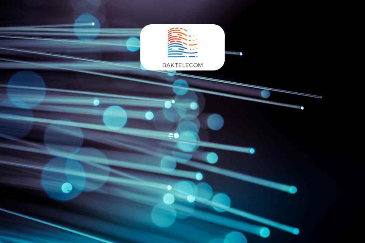 Fiber optic cables with glowing blue lights and logo.