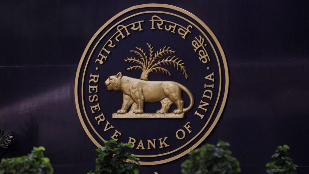 Reserve Bank of India emblem with tiger and palm tree.