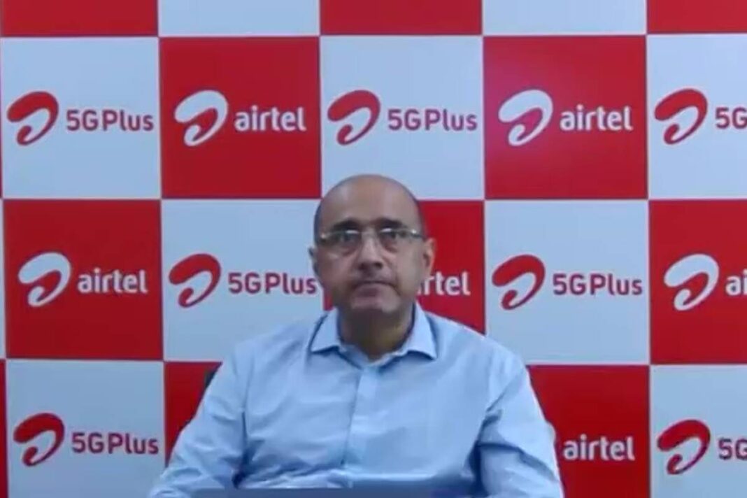 Man with Airtel 5G Plus backdrop.