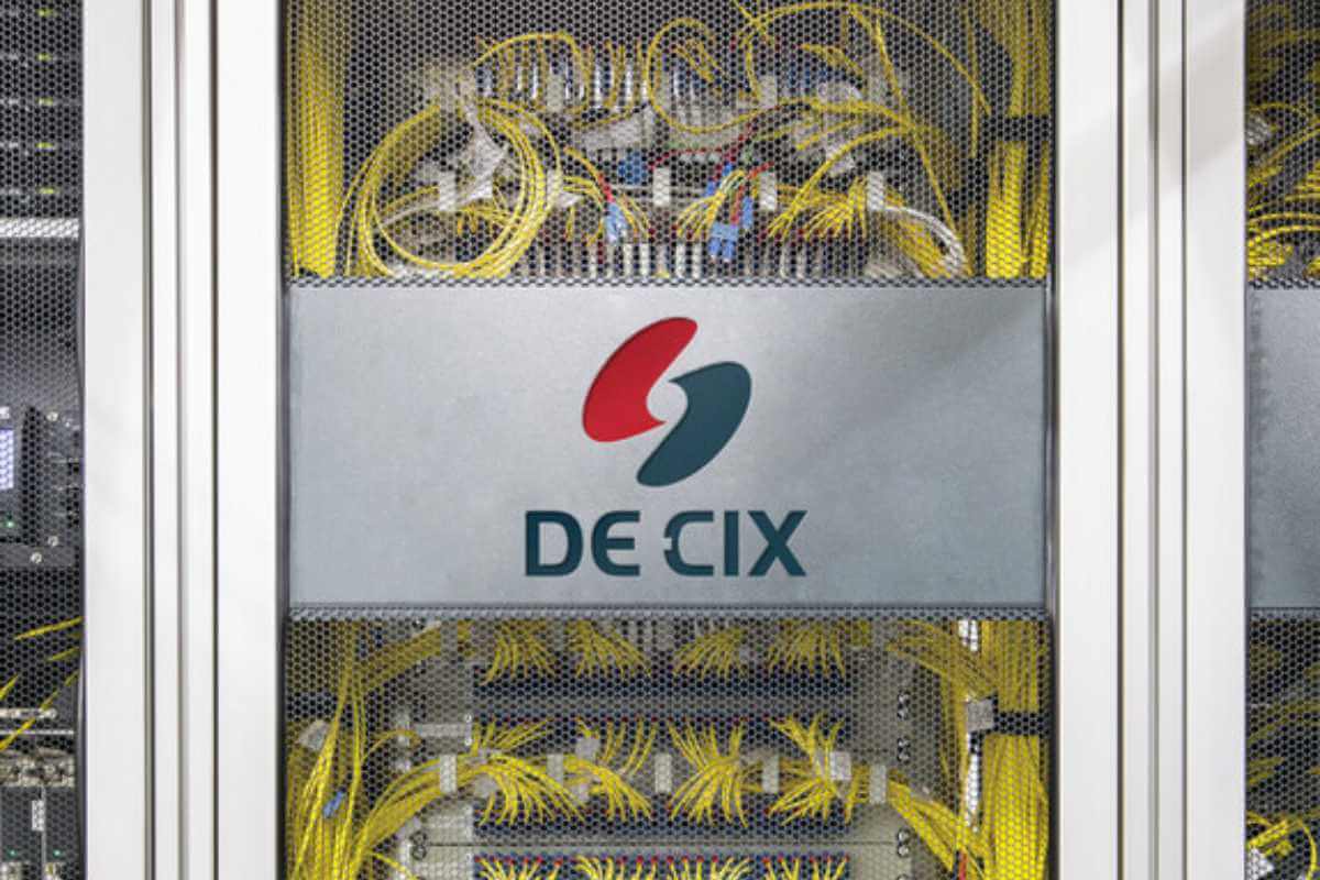 Data center networking cables with DE-CIX logo.