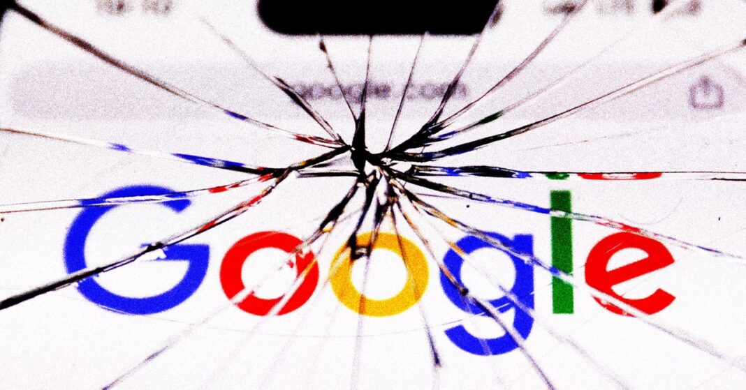 Cracked screen displaying Google logo.