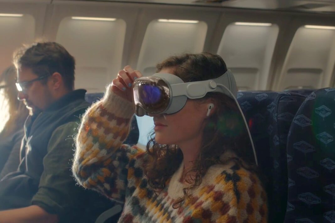 Woman using VR headset on airplane