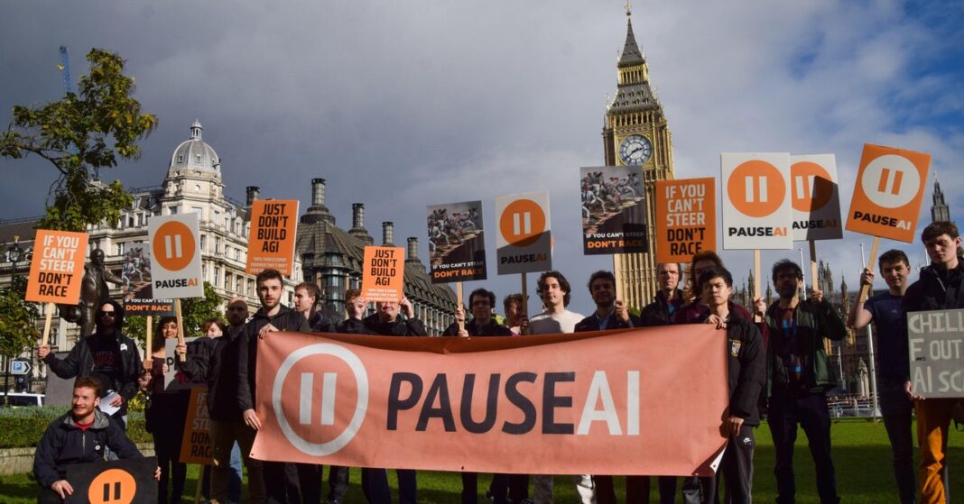 Protesters with "PAUSEAI" banner in front of Big Ben.