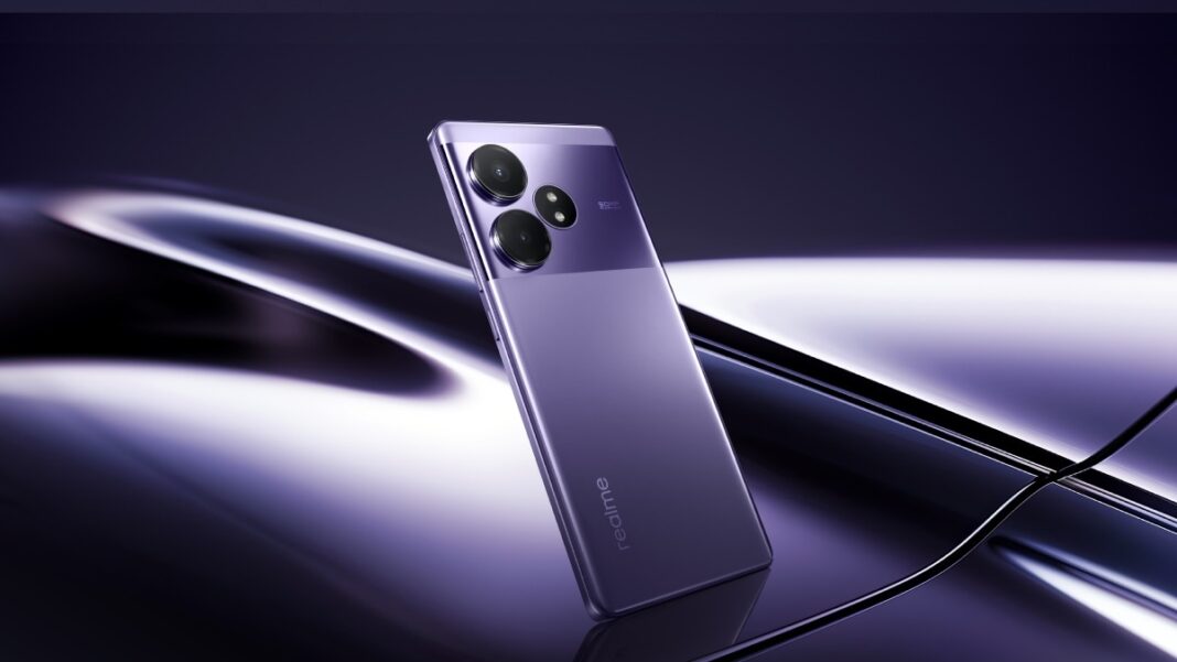 Realme smartphone with triple cameras on reflective surface.