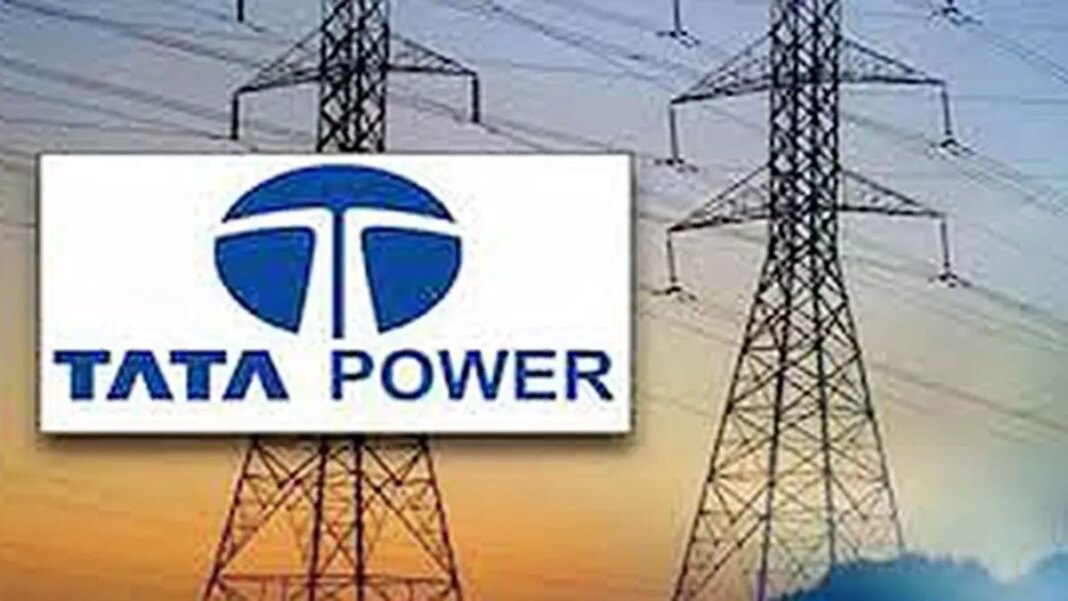Tata Power signboard with electricity pylons in background.
