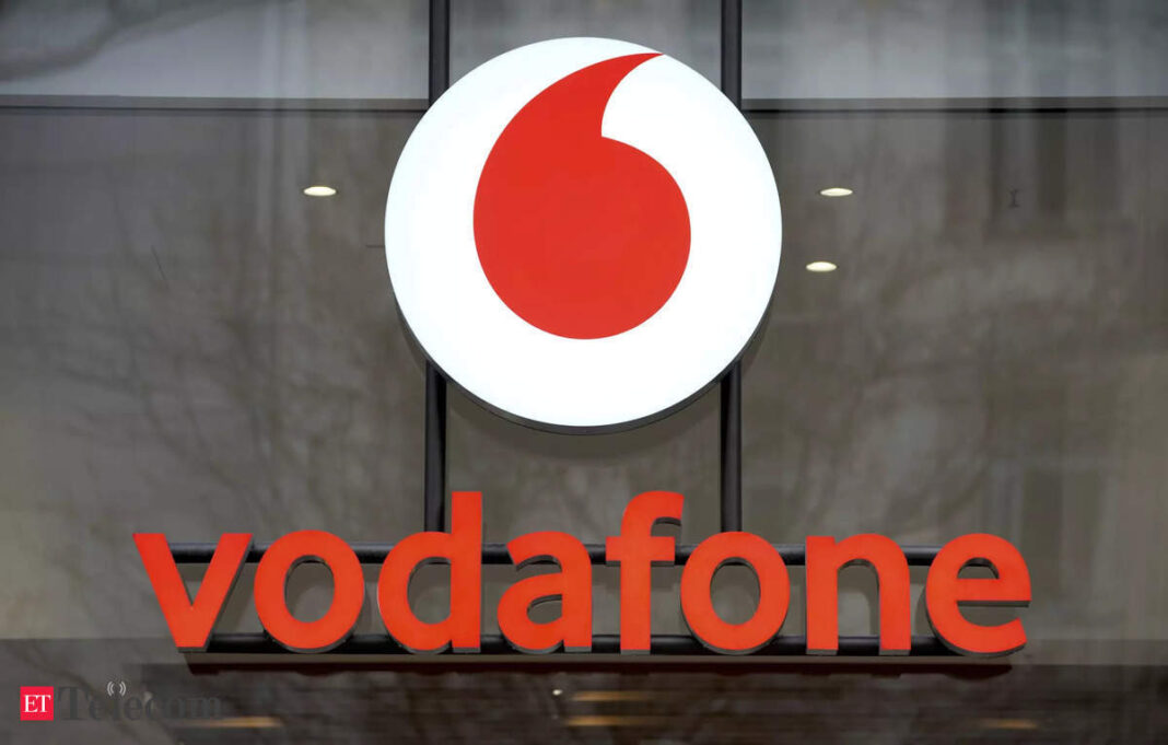 Vodafone logo on storefront window.