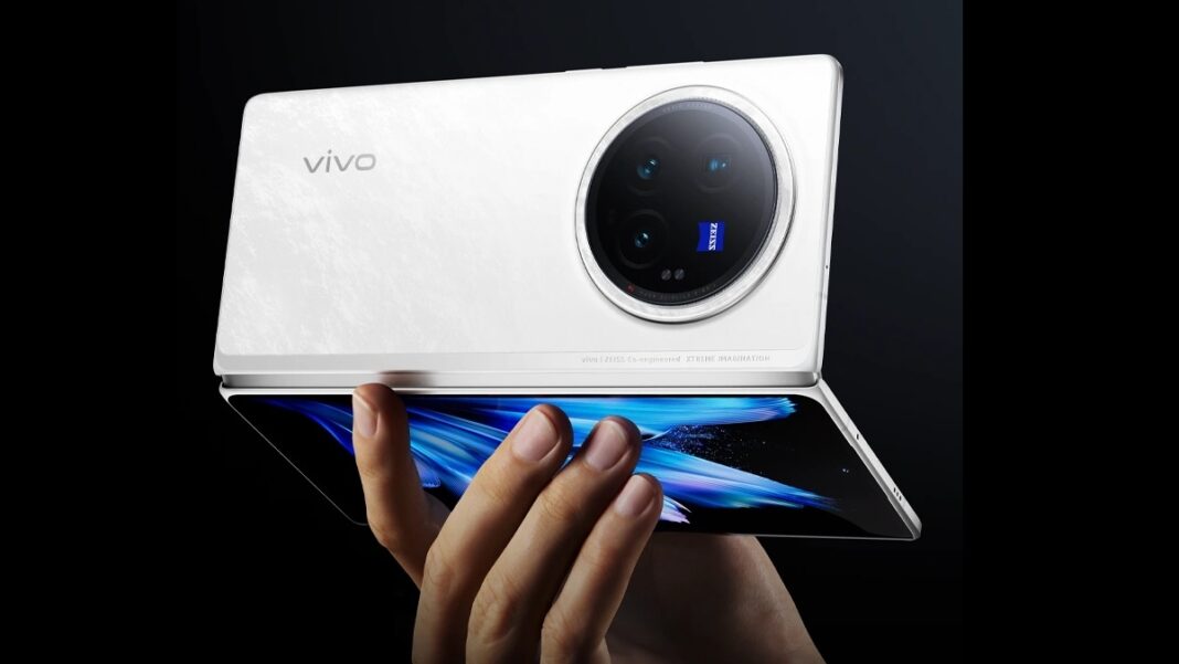 Hand holding a white Vivo smartphone.
