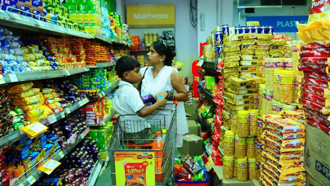 Mother and child shopping in colorful grocery store aisle.