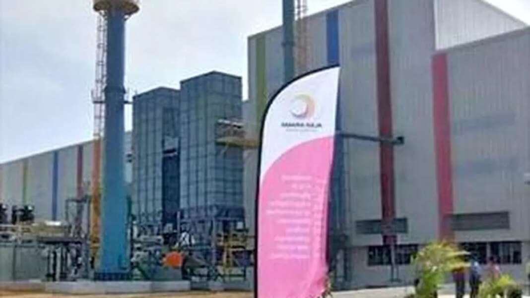 Industrial plant building with promotional banner.