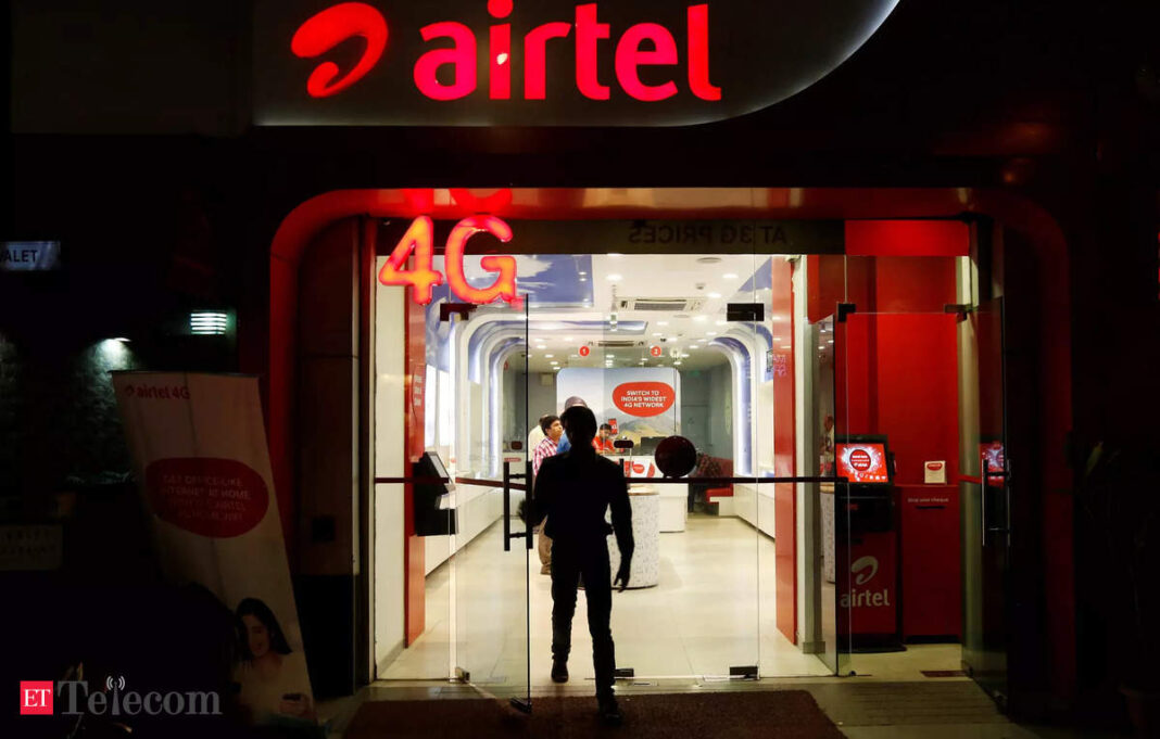 Airtel store entrance with 4G signage at night.