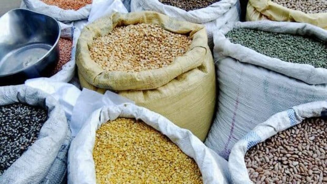 Bags of various grains and pulses at market.