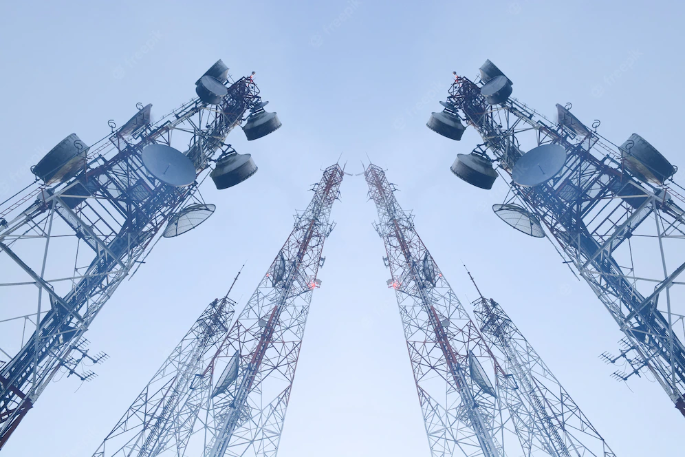 Cellular towers against clear sky.