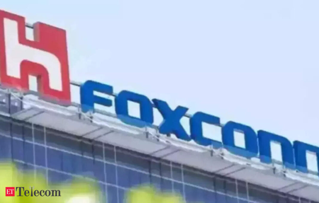 Foxconn company sign on building exterior.