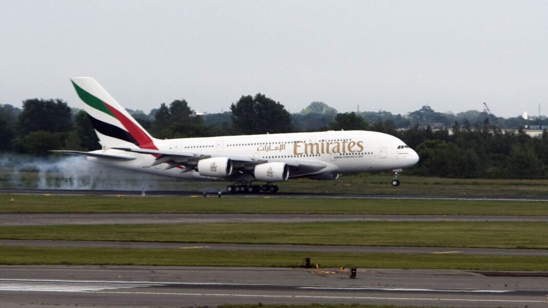 Emirates A380 landing at airport runway