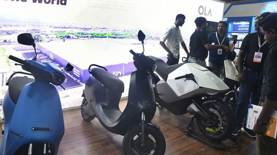 Electric scooters on display at technology expo.