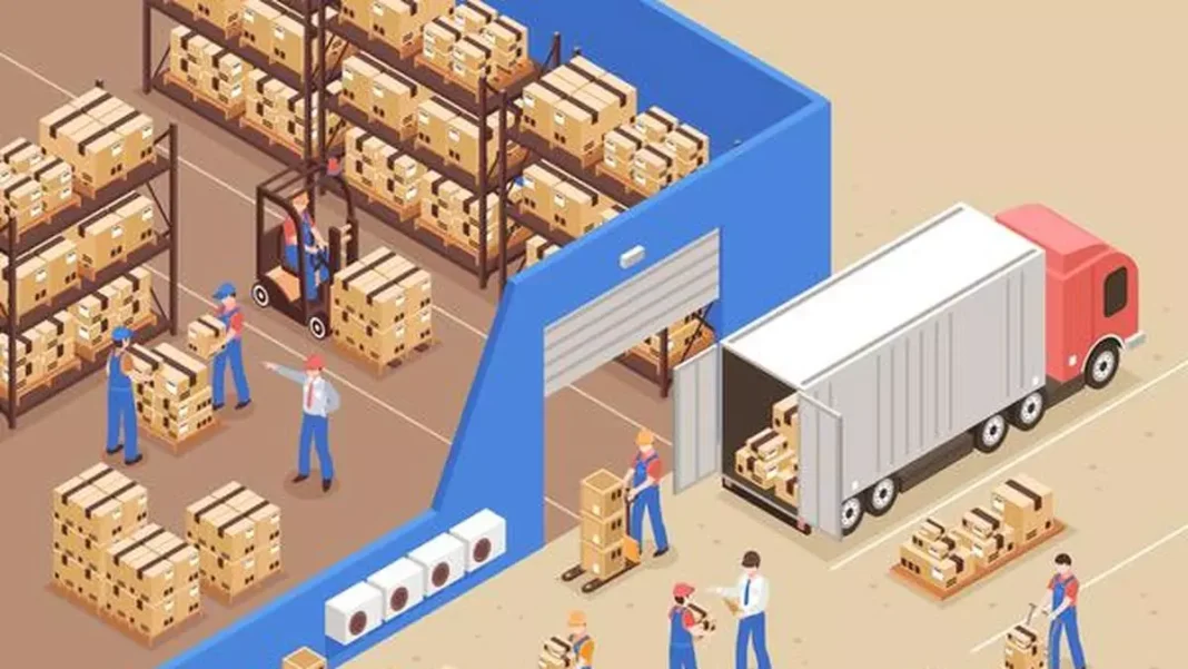Workers in a busy warehouse with forklift and truck.