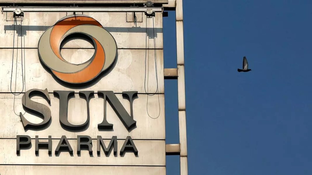 Sun Pharma logo on building with flying bird.