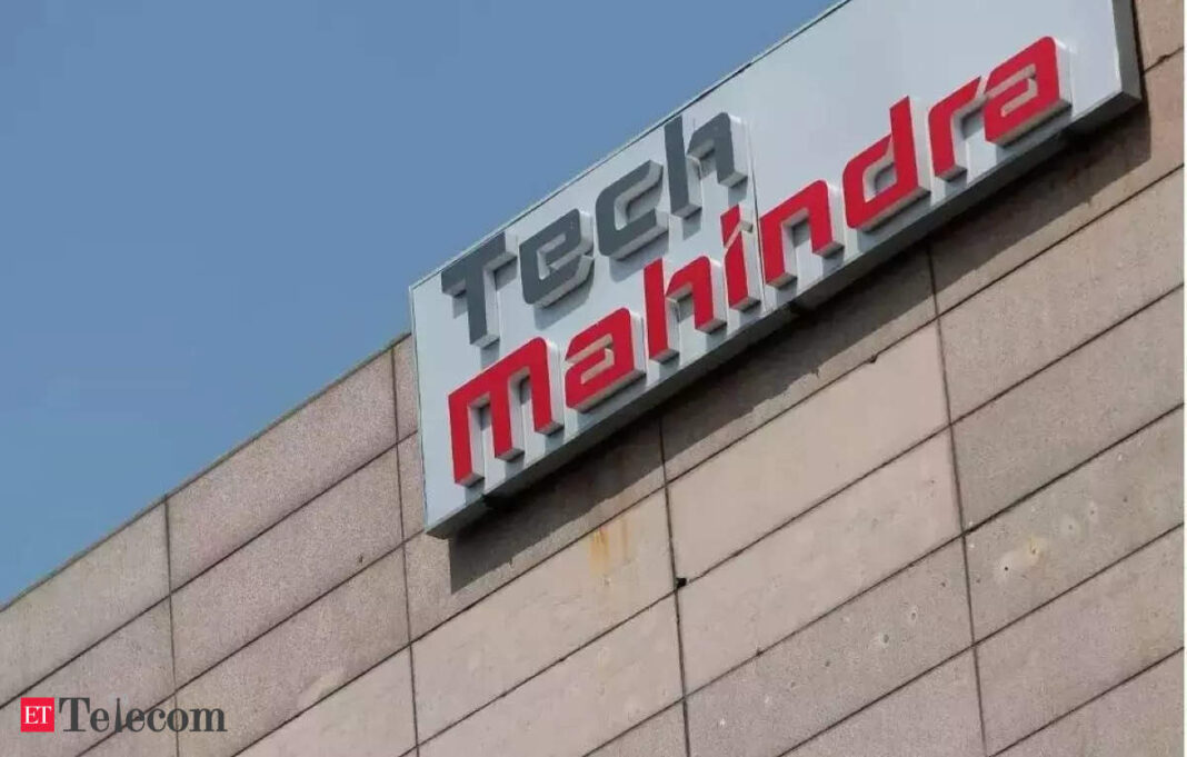 Tech Mahindra company logo on building facade.